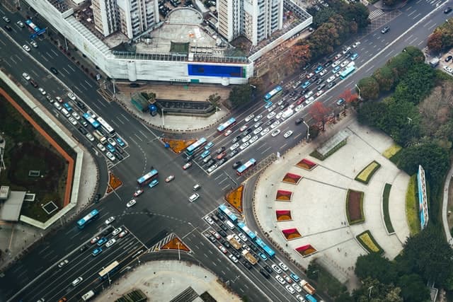 overview of city intersection with lots of cars